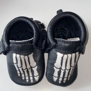 Freshly Picked Black Leather Baby Moccasins with Skeleton Design. Size 2